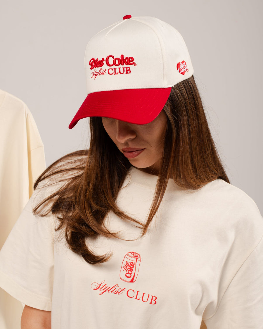 Stylist wearing the Diet Coke® by Framar hat